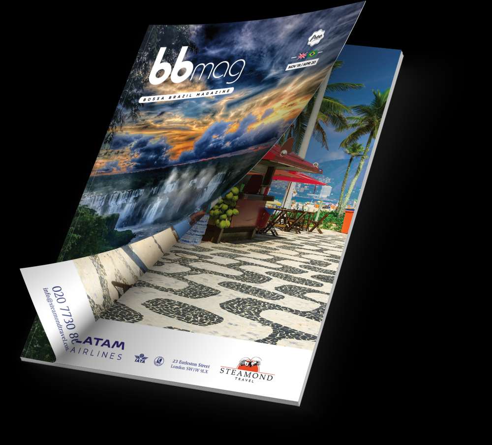 Copies of BBMag magazine fanned out, the cover showing a beach and a waterfall.